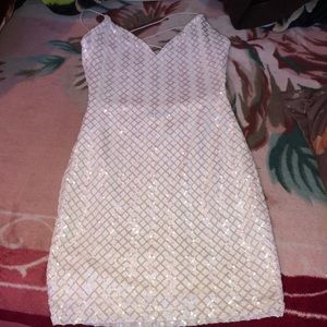 White sparkly dress (opened from the back).